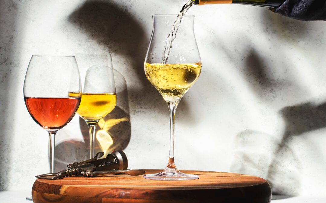 White wine pouring into glass